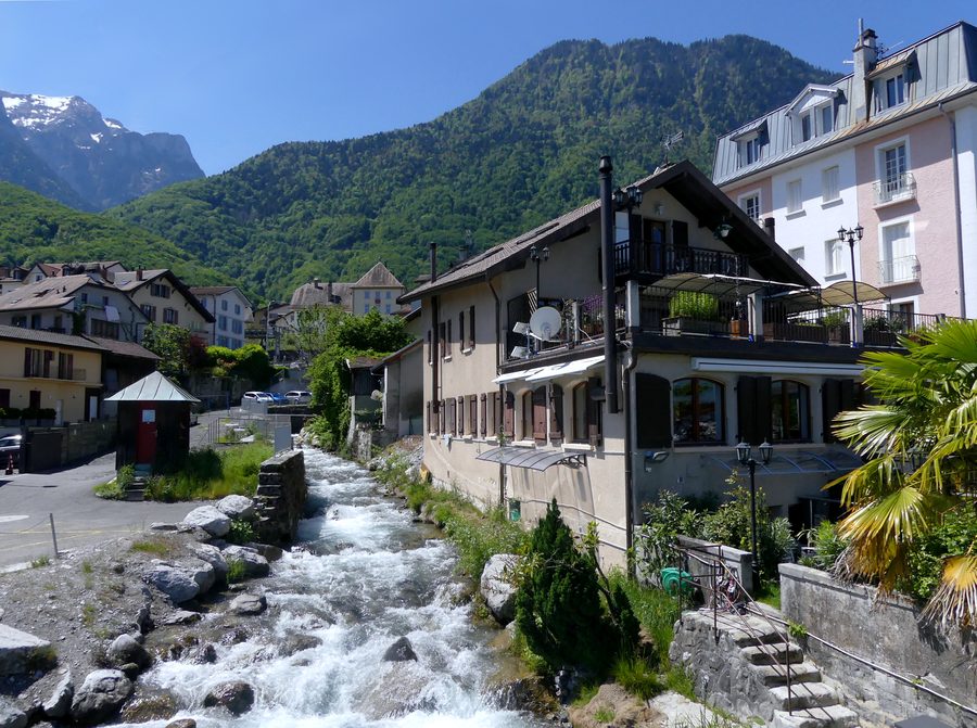 The Morge river at Saint-Gingolph, forming the natural border between Switzerland and France, viewed from a footbridge near its mouth into Lake Geneva.